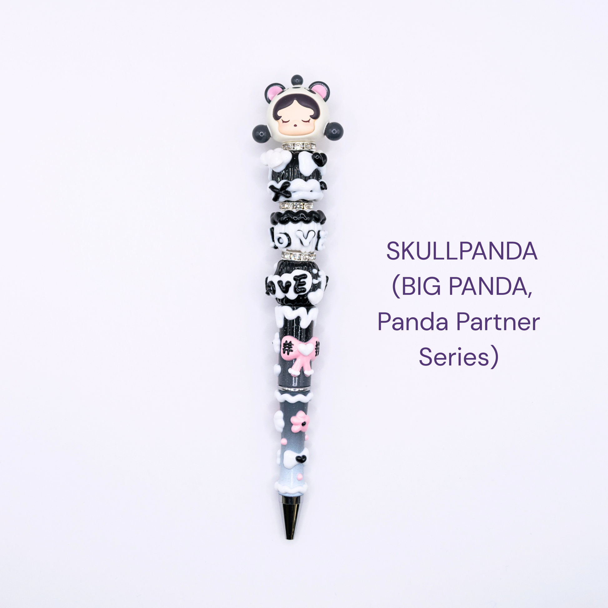 Colorful beaded pen with cartoon character design on a white background, labeled 'SKULLPANDA Big Panda partner series'.