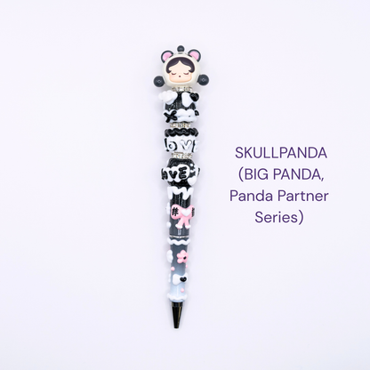 Colorful beaded pen with cartoon character design on a white background, labeled 'SKULLPANDA Big Panda partner series'.