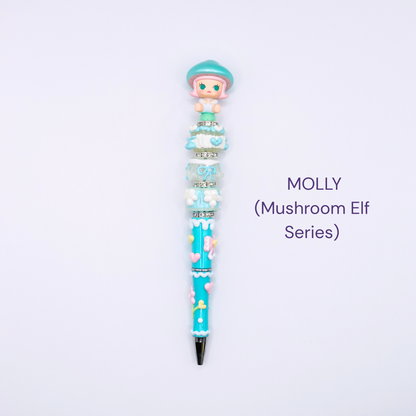 Colorful beaded pen with cartoon character design on a white background, labeled 'MOLLY Mushroom Elf Series'.