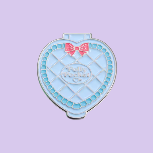 Heart-shaped blue pouch with a pink bow on a light purple background