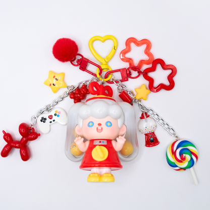 Heart keychain featuring Supertutu GAME START figure from Pop Mart's HAPPY-ING! Series and matching charms on white background