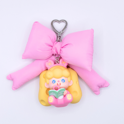 Heart keychain featuring Supertutu figure from Pop Mart's HAPPY-ING! Series and a pink bow