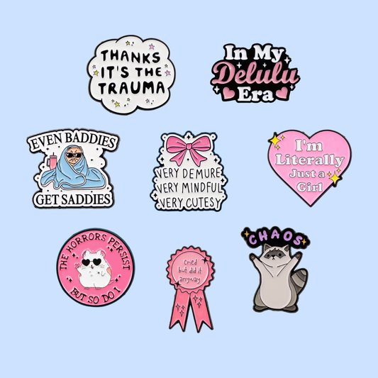 Collection of colorful stickers with various designs and text on a light blue background