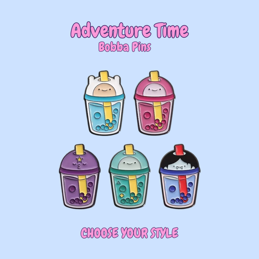 Five colorful Bobba Pins with cartoon faces on a light blue background, featuring the text 'Adventure Time Bobba Pins' and 'Choose Your Style'.