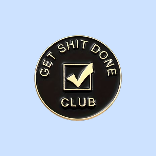 Round black badge with 'GET SHIT DONE CLUB' text and a check mark on a light blue background