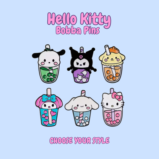 Set of Hello Kitty-themed bobba pins on a light blue background