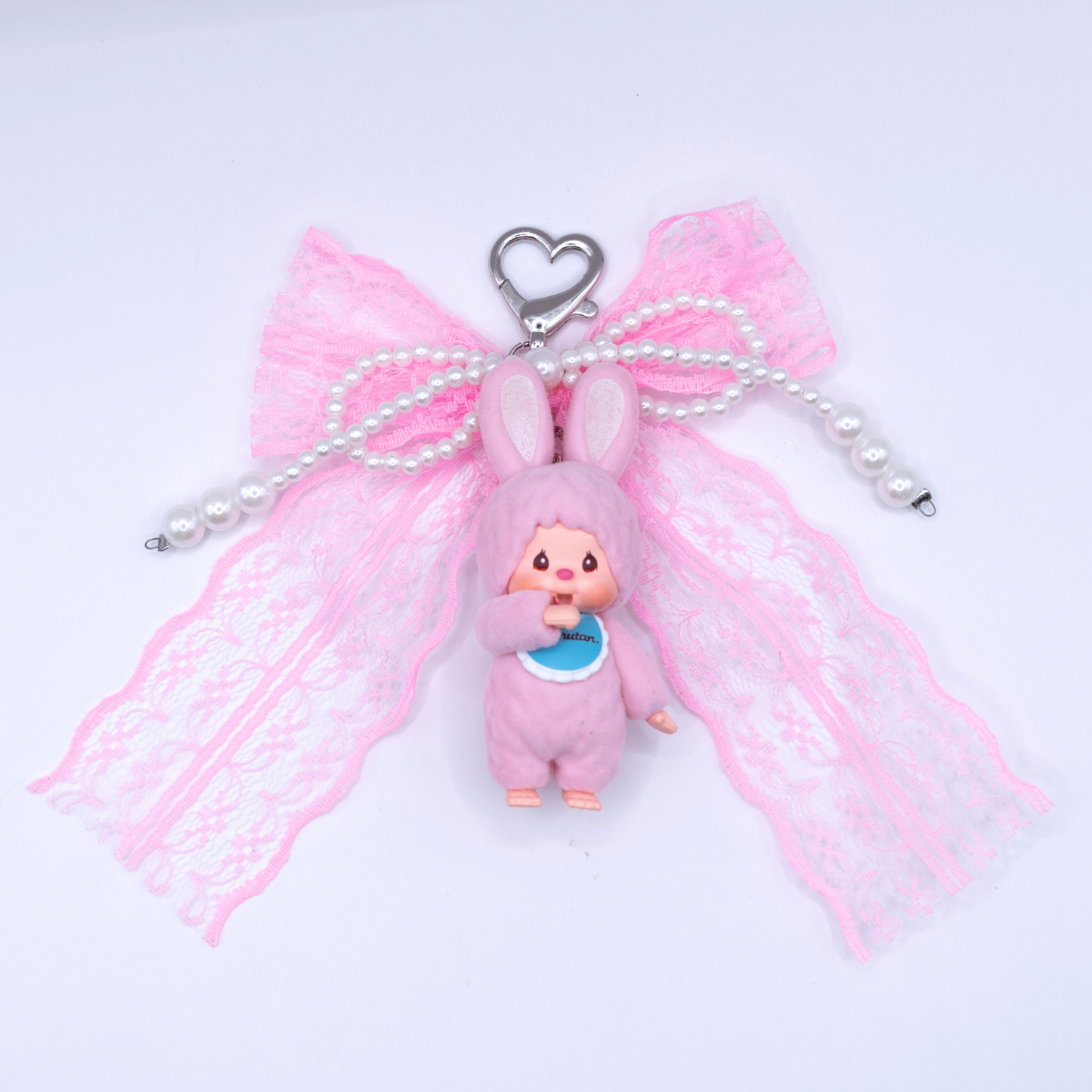 Handgefertigter MONCHHICHI-Schlüsselanhänger mit beflocktem Maskottchen (Chimutan Ver.) und rosa Schleife