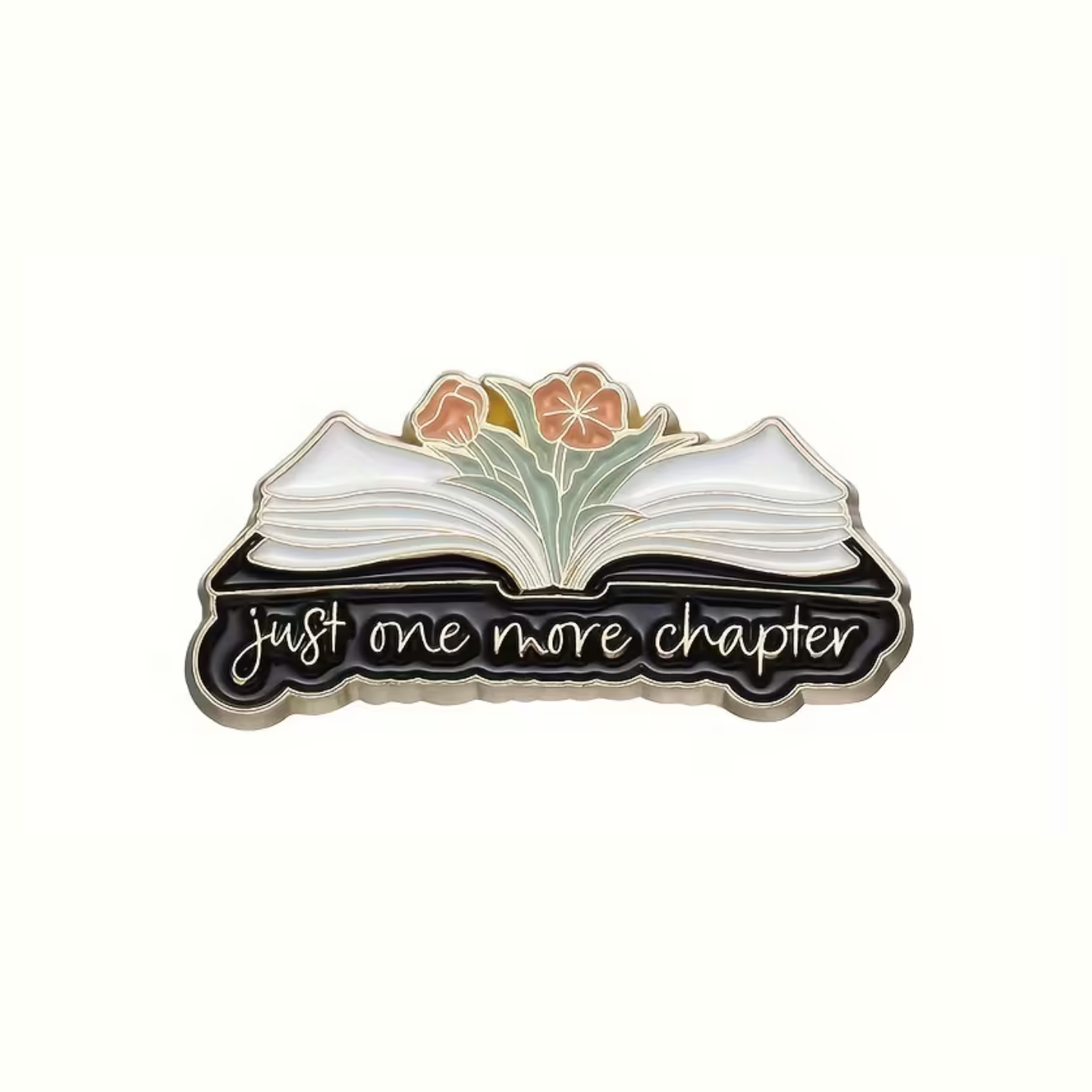 Enamel pin with an open book design and 'just one more chapter' text on a white background