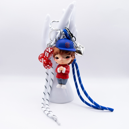 Silver heart keychain with Hirono Silk Royale figure from POP MART's Clot series and matching charms including blue lanyard, black and white lanyard, silver heart, white rotary phone, three red dice.