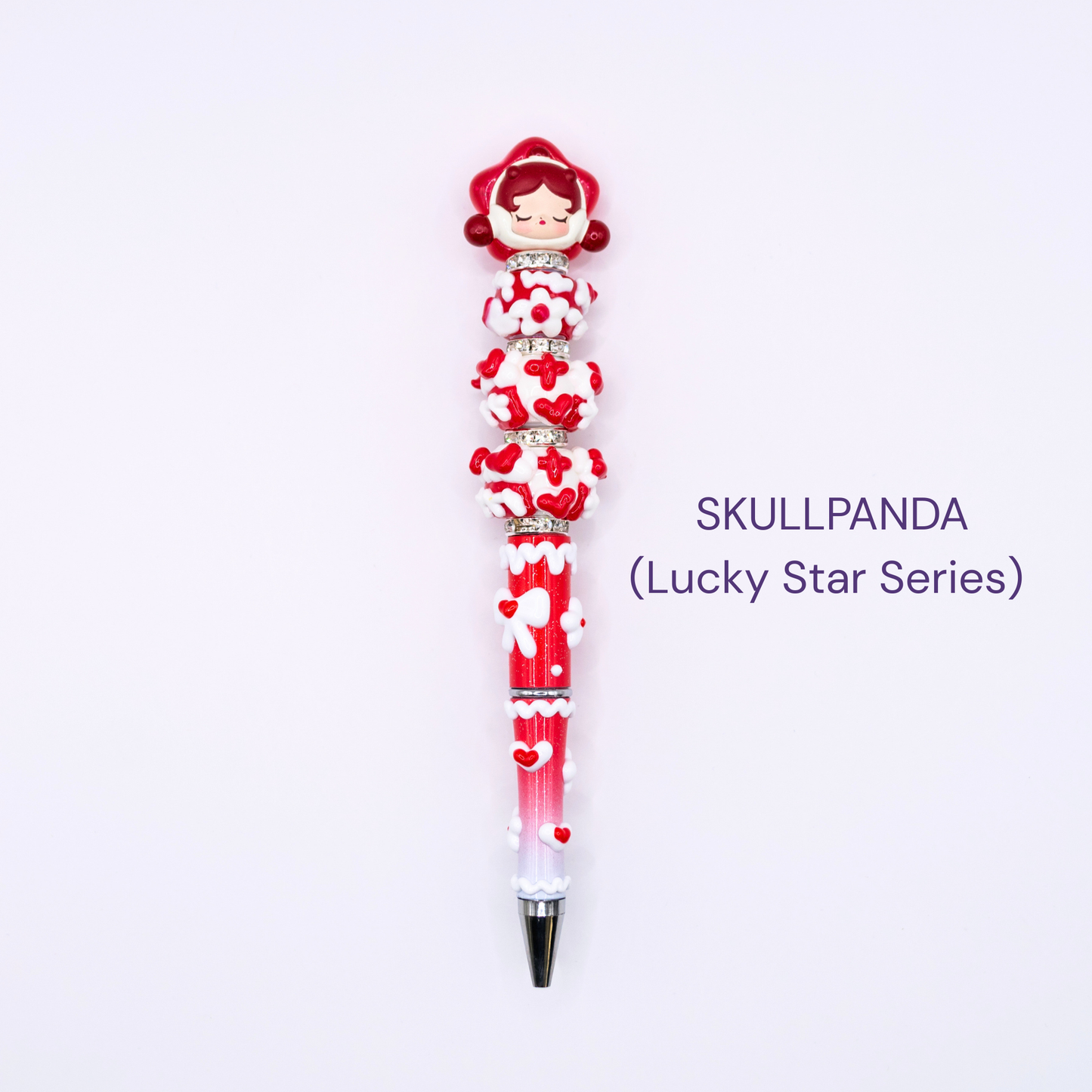 Colorful beaded pen with cartoon character design on a white background, labeled 'Skullpanda Lucky Star Series'.