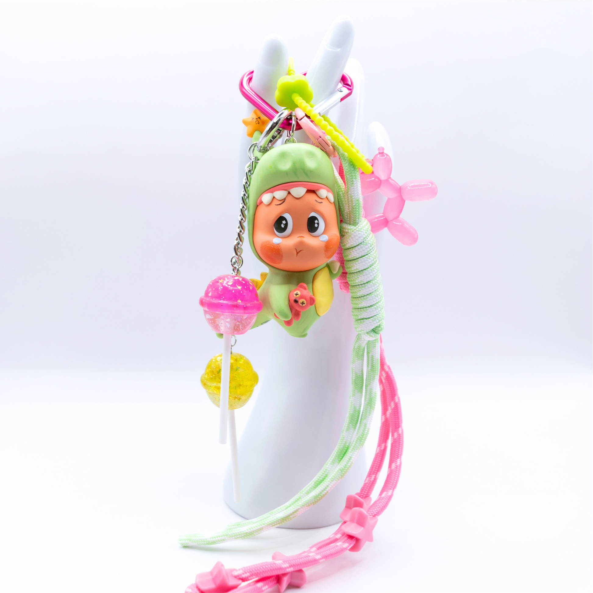 Pink heart keychain with Twinkle Twinkle Lose A Tooth figure from Be A Little Star Series and matching charms (pink and green lanyard, pink ballon doll on green rubber chain, pink and yellow lollipop on silver chain